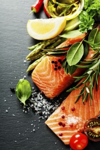 Delicious portion of fresh salmon fillet with aromatic herbs,