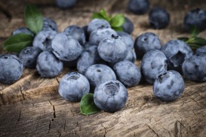 Blueberry with leaves. Organic food.