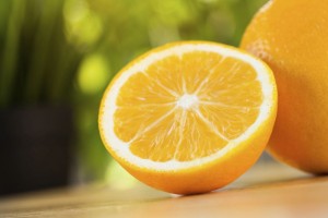 Fresh organic oranges on sunny day