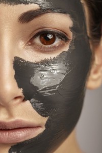 Beautiful woman with facial mask.